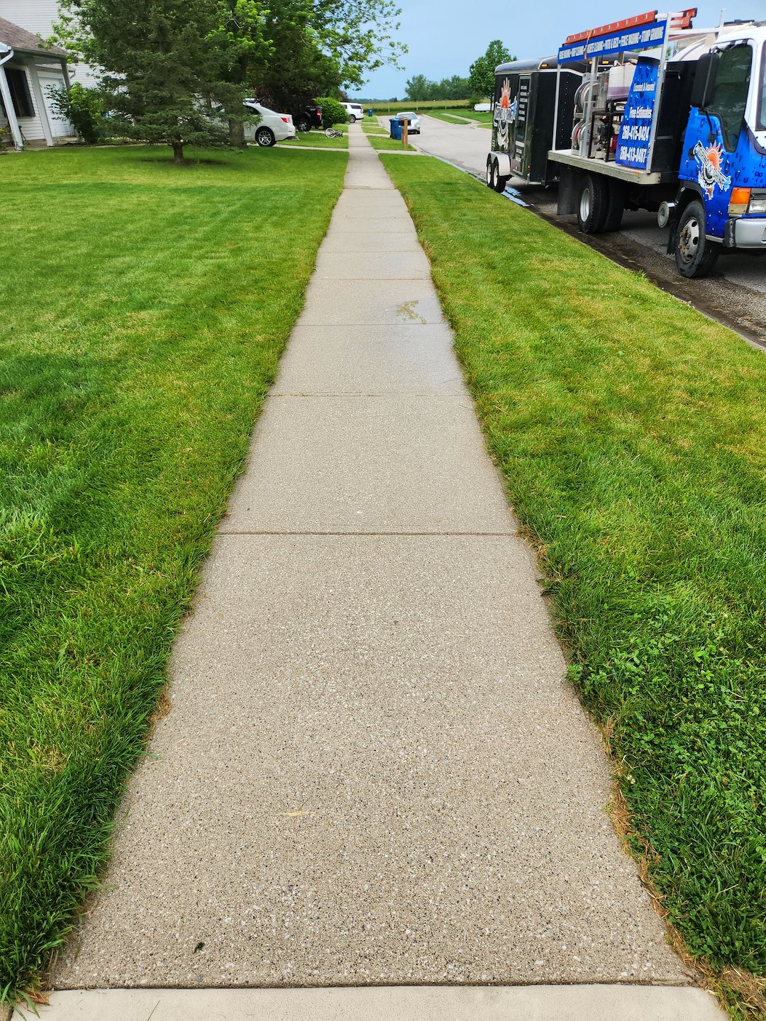 Pressure Washing a Driveway and Sidewalk Near Fort Wayne, IN